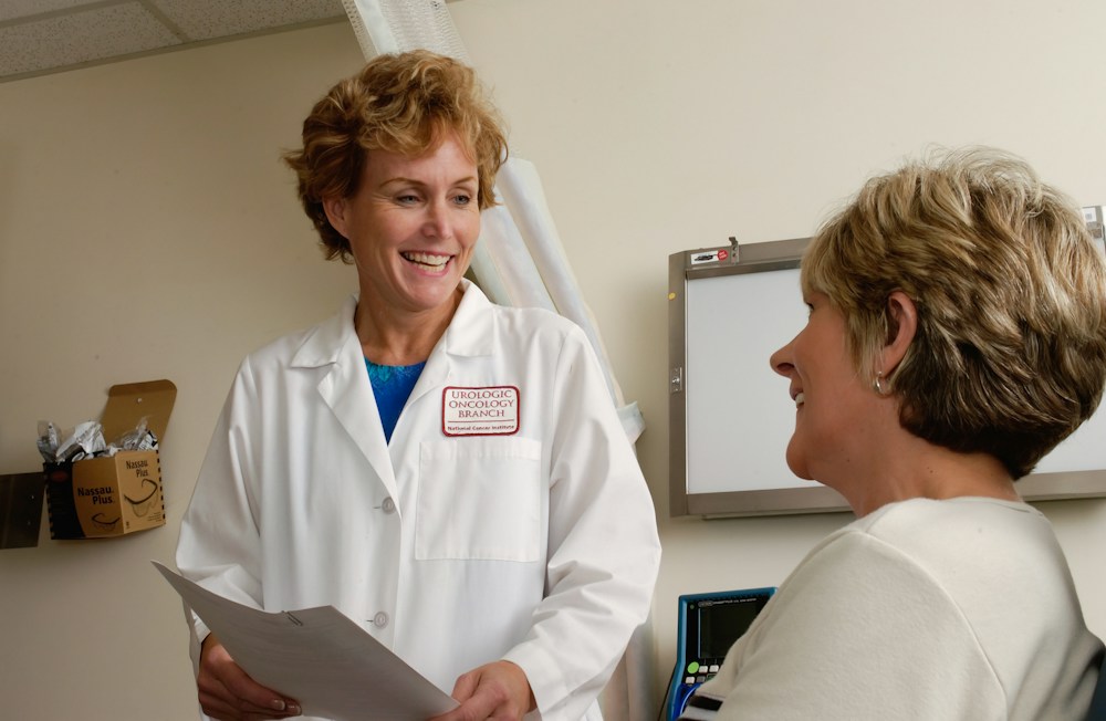 A doctor speaking with a patient in a clinic