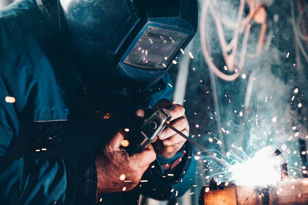 A skilled tradesperson working in a workshop